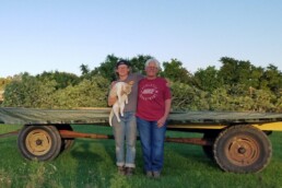 Glacial Loam Farm owner, Deb (right) with farm friends in front of their hemp haul!